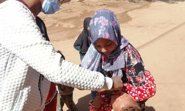 A child being vaccinated against polio in Aswan in March 2021 - Health Ministry branch in Aswan