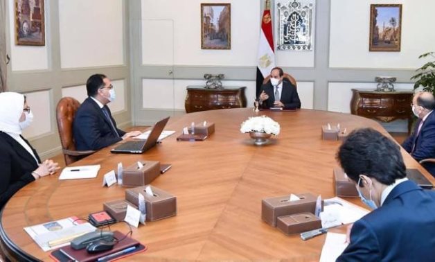 President Sisi in meeting with PM, and three ministers to follow up on 'Decent Life' initiative on March 7, 2021 - Press Photo
