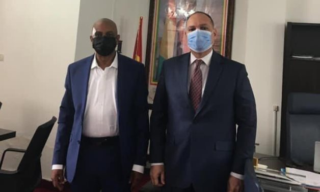 Egypt's Ambassador to Guinea Tamer Kamal El Meligi and Guinea Minister of Education Alpha Amado Bano Barry on March 10, 2021. Press Photo