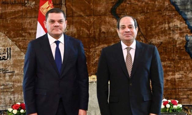 FILE - Egyptian President Abdel Fattah El Sisi receives new Libyan Prime Minister Abdulhamid Dbeibeh in February in Cairo - press photo