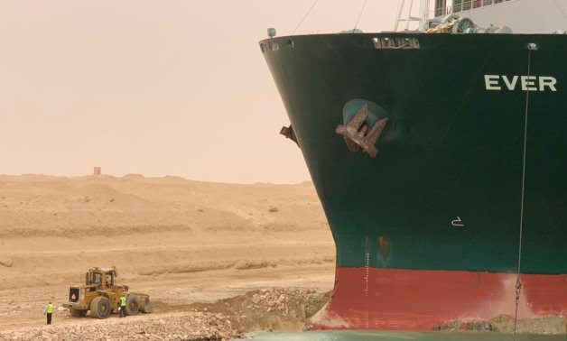 Attempts to save the aground cargo ship "Ever Given" in Suez Canal on March 24, 2021. Press Photo
