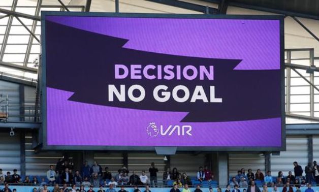 General view of the big screen displaying the VAR decision REUTERS/Phil Noble