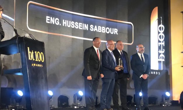 Youm7 editor-in-chief Khaled Salah hands award to the son of late engineer Hussein Sabbour – Egypt Today