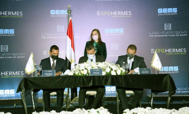 Minister of Planning and Economic Development Hala al-Said witnesses signing of MoUs between Sovereign Fund of Egypt on one hand and EFG Hermes and GEMS on the other hand. Press Photo  