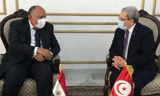 Egypt's Foreign Minister Sameh Shoukry (left) with his Tunisian counterpart Othman Jerandi - Press photo