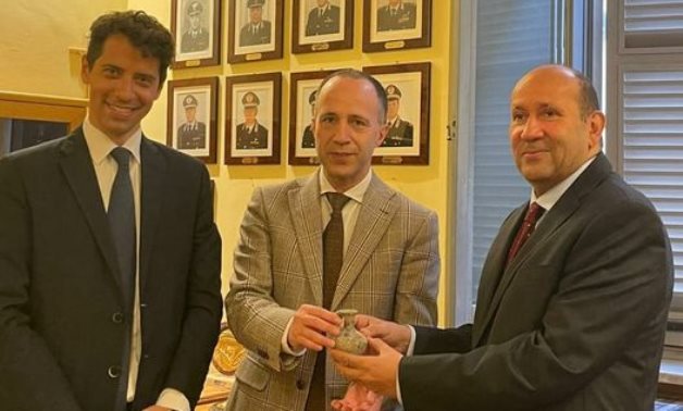 Egypt's Ambassador to Rome Hesham Badr receiving two artifacts that had been smuggled to Italy in 2019 on April 29, 2021. Press Photo 