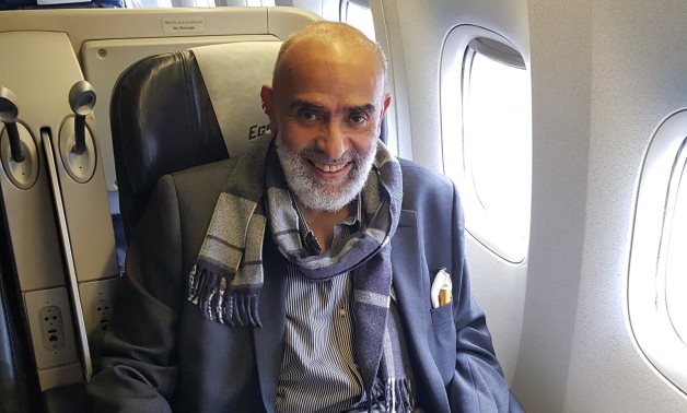 Ashraf El-Saad publishes a photo on his Twitter in the plane while returning from London to Cairo