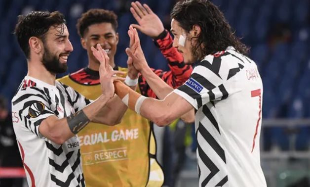 Cavani celebrates scoring their second goal with Bruno Fernandes, Reuters 