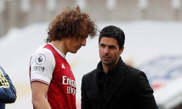 Arsenal’s Brazilian defender David Luiz and the team manager Mikel Arteta, Reuters 