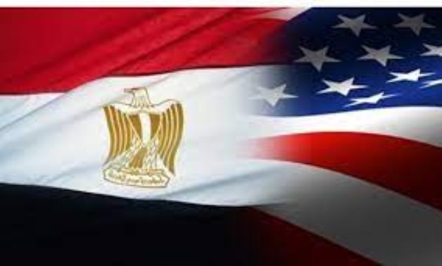 FILE – Egyptian and U.S. flags 