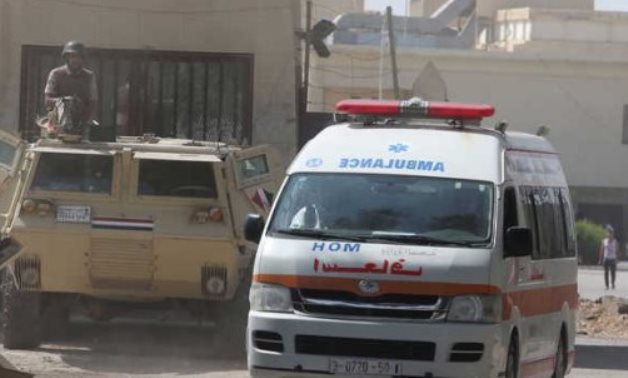 FILE - Egyptian ambulances at the Rafah border crossing - Reuters