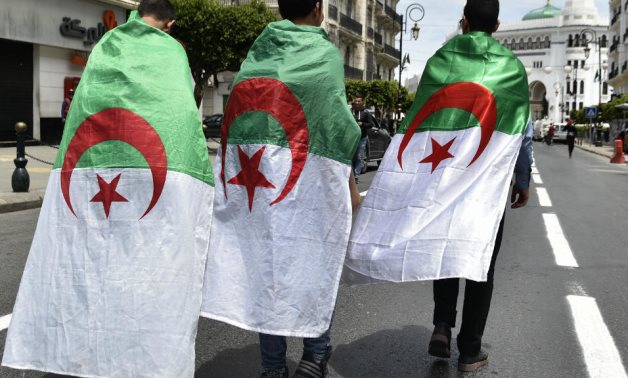 Ryad Kramdi, AFP | Algerian students take part in a demonstration to mark the 63rd anniversary of National Student Day in the capital Algiers on May 19, 2019.