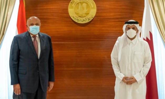 Minister of Foreign Affairs Sameh Shoukry with the Deputy Prime Minister and Minister of Foreign Affairs of Qatar, Sheikh Mohammed bin Abdulrahman Al-Thani in Doha on Monday- press photo
