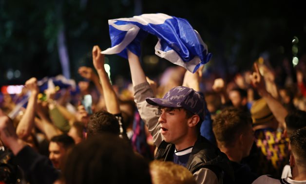 June 18, 2021 Scotland fans celebrate in London after the match REUTERS/Henry Nicholls