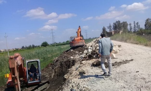 Paving a road in the countryside as part of Haya Karima - Archive