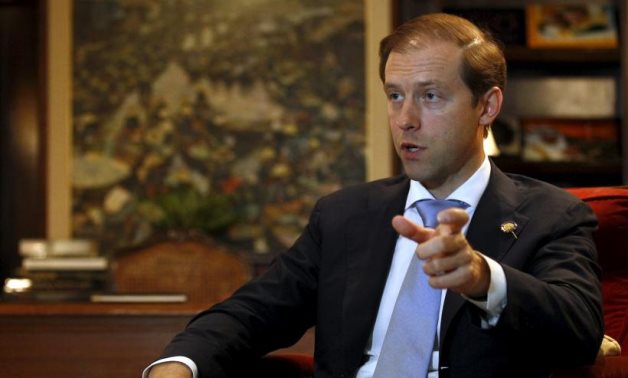 Denis Manturov, Russia's minister of industry and trade, gestured during an interview with Reuters at a hotel in Bangkok, April 8, 2015 - Reuters