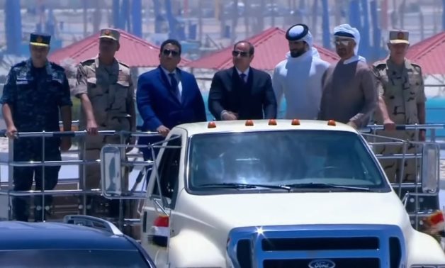 Sisi accompanied Abu Dhabi Crown Prince Mohammed bin Zayed and Head of Libya's Presidential Council Menfi in his tour at the 3 July Base – Screenshot/Ten TV