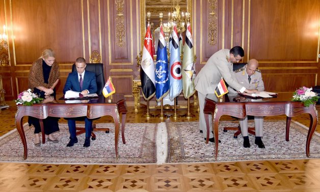 Minister of Defense and Military Production Mohamed Zaki and his Serbian counterpart Nebojša Stefanović signing a military cooperation protocol in Cairo, Egypt on July 14, 2021. Press Photo