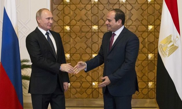Russia's President Vladimir Putin (L) meets with Egypt's President Abdel Fattah al-Sisi in Cairo, Egypt December 11, 2017. REUTERS/Alexander Zemlianichenk