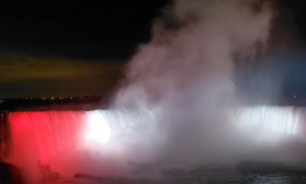 File- File: Niagara Falls lit up in the colors of the Egyptian flag to celebrate 68th anniversary of the July revolution