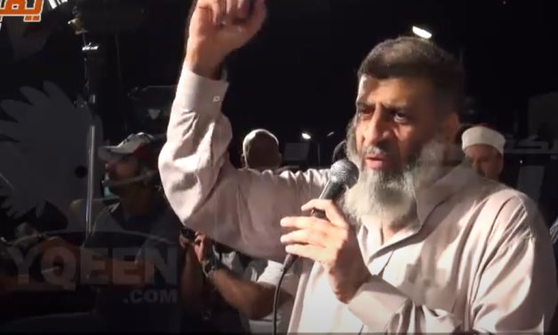 Islamic Group leader Assem Abdel Maged on Rabaa sit-in's podium - Youtube still