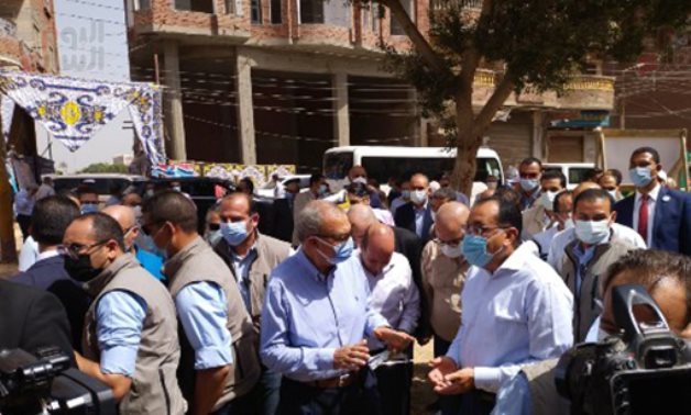Egypt's PM during an inspection tour in Shebin El Qanatir township of Qalubiya governorate.