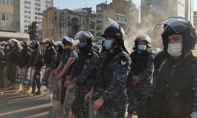 Police personnel stand during protests in Lebanon – file photo