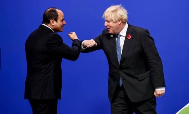 President Abdel Fatah al-Sisi greeting UK Prime Minister Boris Johnson at opening of COP26 held in Glasgow on November 1, 2021. Press Photo
