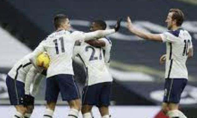 Tottenham Hotspur's Son Heung-min celebrates scoring their second goal with teammates Pool via REUTERS/Matt Dunham