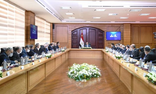 President Abdel Fatah al-Sisi convening with the Supreme Council of Universities while on a visit to Kafr El Sheikh University on December 14, 2021. Press Photo