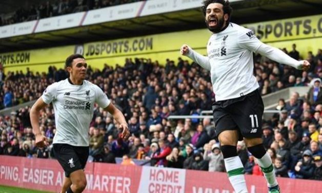 Liverpool's Mohamed Salah celebrates scoring with Trent Alexander-Arnold REUTERS/Dylan Martinez