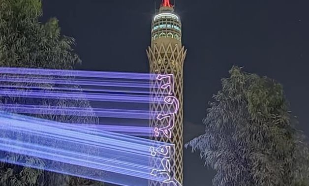 Cairo Tower lit up in the colors of the Qatari flag, on Friday, to celebrate the National Qatari Day- press photo