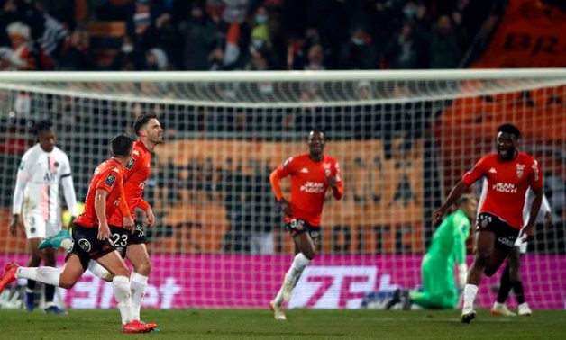 Lorient's Thomas Monconduit celebrates scoring their first goal with teammates REUTERS/Stephane Mahe