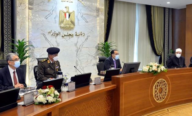 Egyptian Prime Minister Moustafa Madbouli chairs Cabinet's weekly meeting at the new administration capital on December 23, 2021- press photo