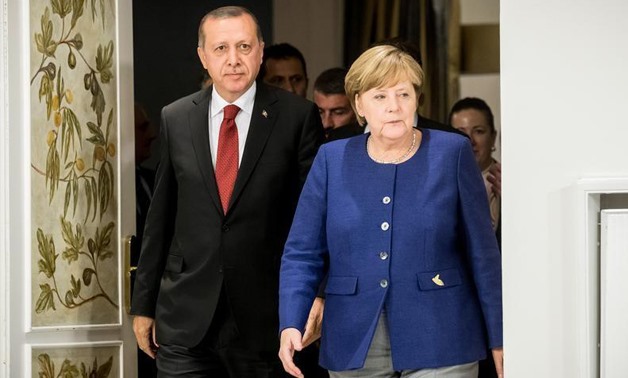 German Chancellor Angela Merkel meets Turkish President Recep Tayyip Erdogan on the eve of the G-20 summit in Hamburg, Germany, July 6, 2017. REUTERS/Michael Kappeler,POOL