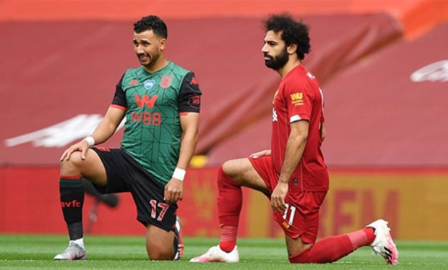 Aston Villa’s Mahmoud Trezeguet and Liverpool’s Mohamed Salah,  Reuters 