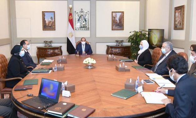 President Sisi meets with Prime Minister Moustafa Madbouli and a number of ministers on January 1, 2022- press photo.