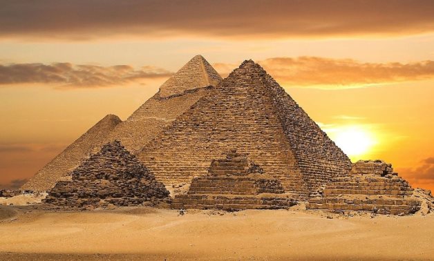 FILE - The Great Pyramids in Giza