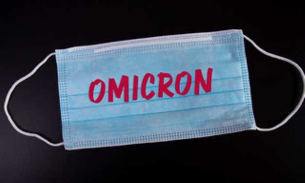 Omicron text on a face mask- CC via Flickr/Jernej Furman