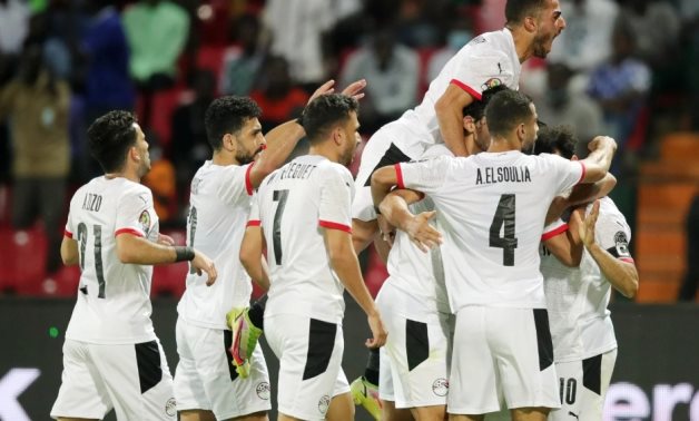 Egypt national team players celebrate Salah's opener, courtesy of CAF website