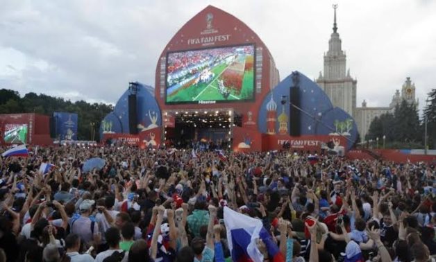 Russian fans celebrate the victory in a fan zone, Reuters
