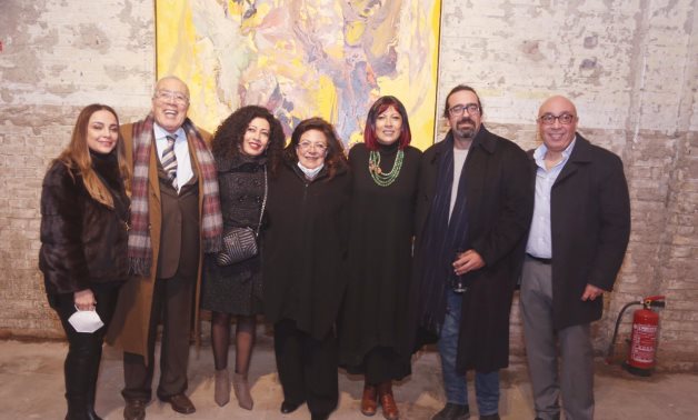 File: Riham El Adl with her family during the inauguration of her exhibition.
