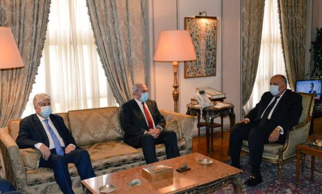 Minister of Foreign Affairs Sameh Shokry (r), Deputy Palestinian Prime Minister Ziad Abou Amr, and Palestinian Minister of Social Development Ahmed Magdalany in Cairo, Egypt on March 7, 2022. Press Photo 