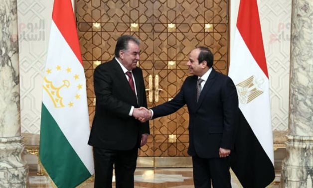 President Abdel Fatah al-Sisi shaking hands with Tajikistani counterpart Emomali Rahmon at Al Itihadiyah Presidential Palace in Cairo, Egypt on March 10, 2022. Press Photo