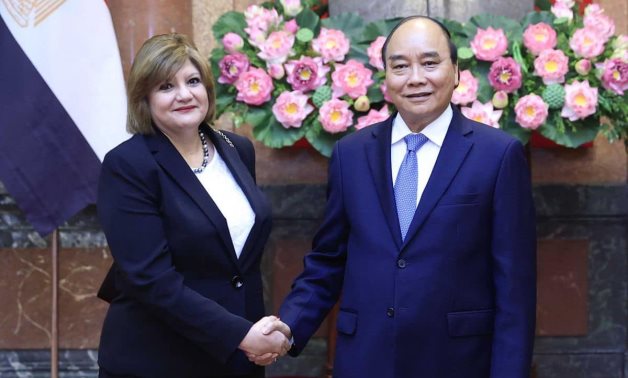 President of the Socialist Republic of Vietnam Nguyen Xuan Phuc shakes hands with Amal Abdel Kader, the new Egyptian ambassador - Egyptian Foreign Ministry