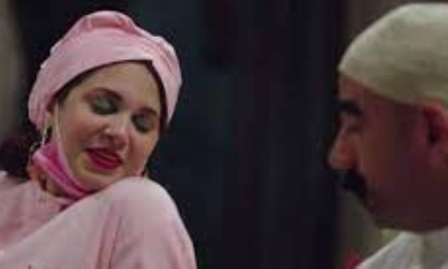 Marbouha tries to seduce her husband wearing a nurse costume in Al Kabir Awe series - Youtube still