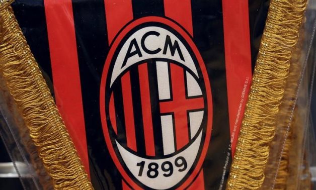 The AC Milan logo is pictured on a pennant in a soccer store in downtown Milan, Italy April 29, 2015. REUTERS/Stefano Rellandini