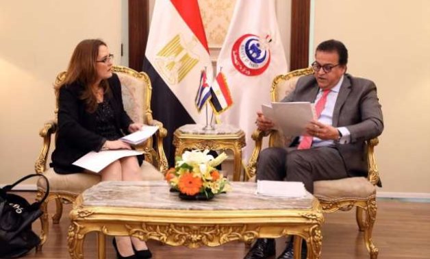 Meeting of Acting Minister of Health and Population Khaled Abdel Ghaffar and Cuban Ambassador to Egypt Tania Aguiar Fernandez on April 17, 2022. Press Photo 