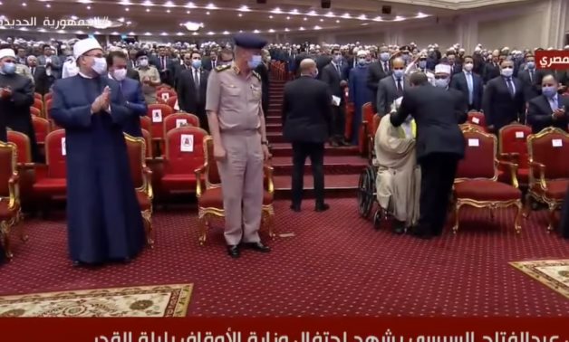 President Abdel Fattah al-Sisi kisses sheikh Ahmed Omar Hashem's head April 27, 2022 - Youtube still