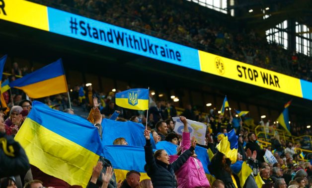 Signal Iduna Park, Dortmund, Germany - Fans in the stands with Ukraine flags REUTERS/Thilo Schmuelgen